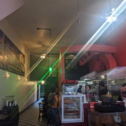 Graffiti pizza - Look at that crew, hard at work!