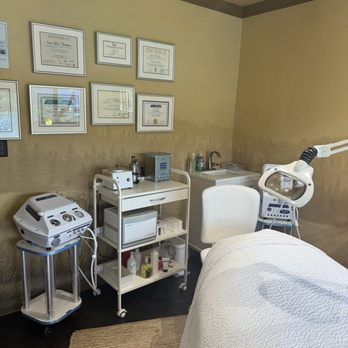 Ultimate Skin - Treatment area with machines and education certificates - Skin Care Near Me - Lake Arrowhead, California