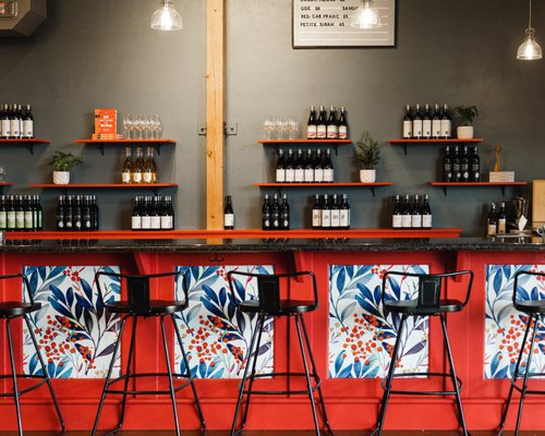 Photo of Covington Cellars - Woodinville, WA, US. a row of bar stools