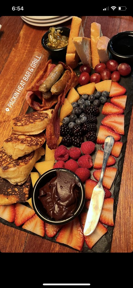 Packin Heat Bar & Grill Logo