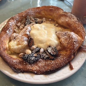 Milktooth - Dutch baby pancake with lemon curd | almonds | figs - Breakfast & Brunch Near Me - Indianapolis, Indiana Milktooth - Dutch baby pancake with lemon curd | almonds | figs - Breakfast & Brunch Near Me - Indianapolis, Indiana