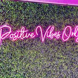 Our aesthetic back wall to spread positive vibes to our costumers.