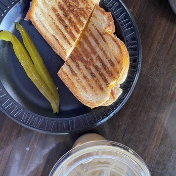 Jirani Coffee House - ham and cheese panini and lavender Latte - Coffee & Tea Near Me - Manassas, Virginia Jirani Coffee House - ham and cheese panini and lavender Latte - Coffee & Tea Near Me - Manassas, Virginia