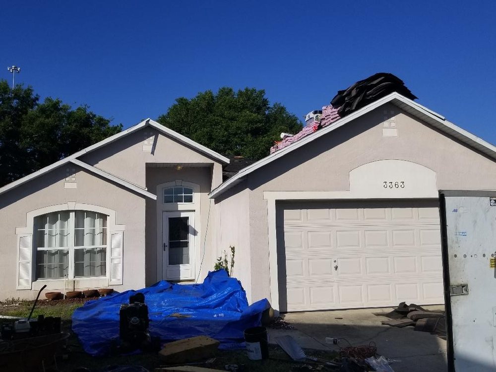 Slide of Model City Roofing