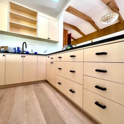 Custom Built Cabinetry - Anigre veneer kitchen