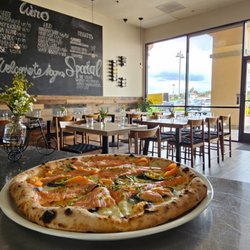 Magma Pizzeria - New special of the week, "the Viking" featuring: smoked salmon, smoked Mozzarella, chives, lemon zest, grilled zucchini.
