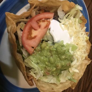 Nachos - Steak taco salad...TONS of meat and peppers under there! - Mexican Near Me - Sandusky, Ohio