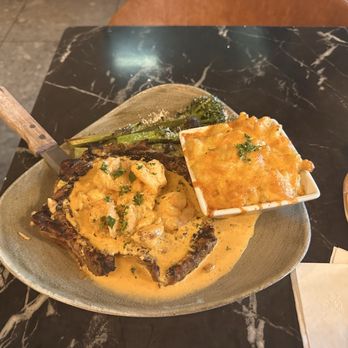 Crab Cab - Surf & Turf Ribeye w/2 Collosal Shrimp, broccolini, and Mac and cheese - Seafood Near Me - Capitol Heights, Maryland Crab Cab - Surf & Turf Ribeye w/2 Collosal Shrimp, broccolini, and Mac and cheese - Seafood Near Me - Capitol Heights, Maryland