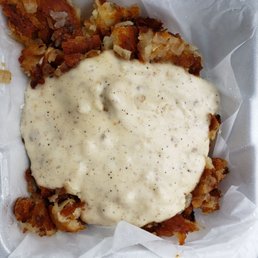 Home fries with sausage gravy. Home fries with sausage gravy.