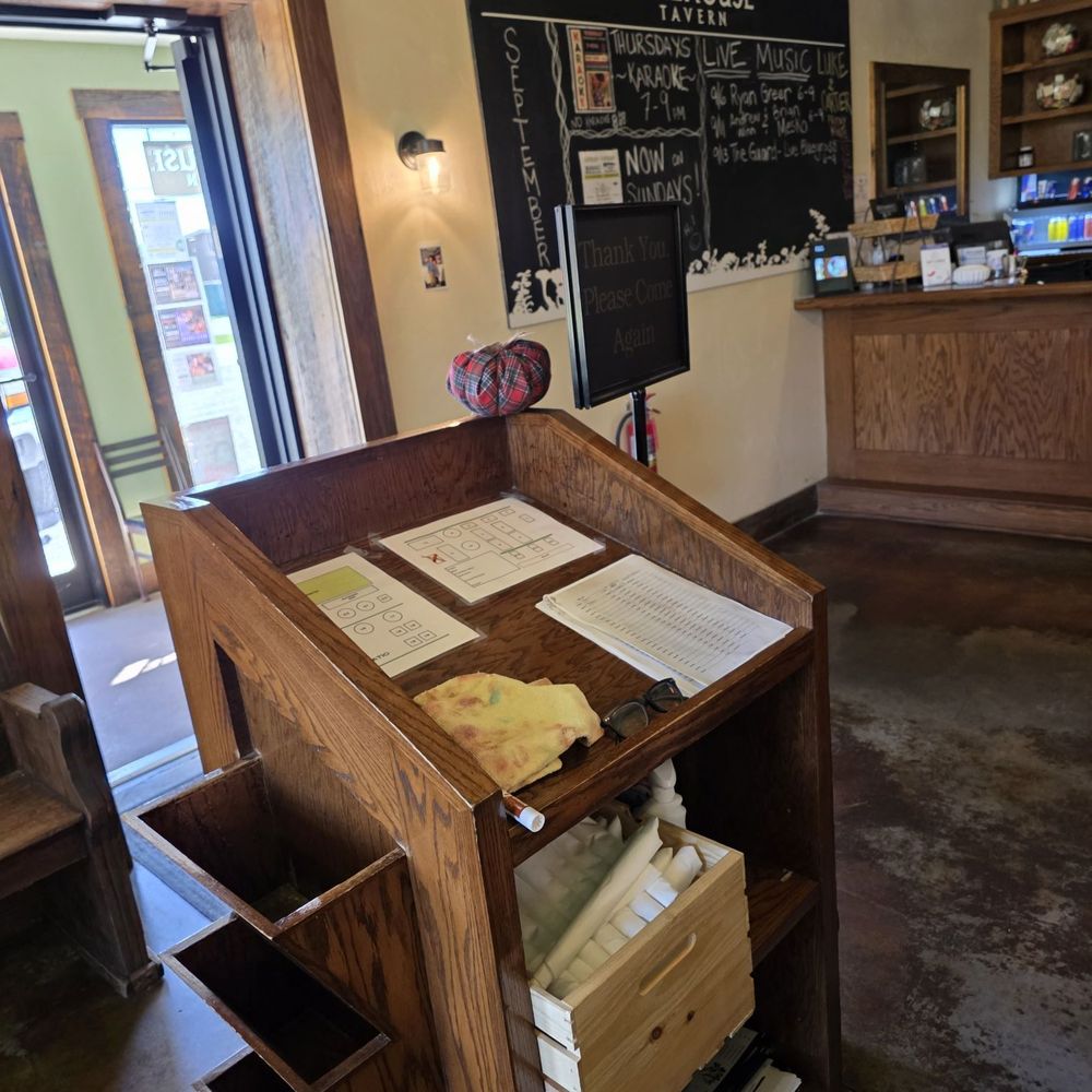 Treehouse Tavern - The Host's station and the small foyer at the entrance of the restaurant in the background. - Bars Near Me - Bent Mountain, Virginia