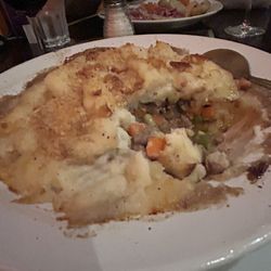 Shepard's Pie filled with ground beef, veggies & an amazing broth. Topped with a crispy mashed potato