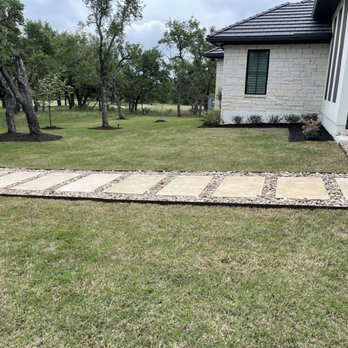 Nova Lawn Care - Installation of brown metal edger , installation of washed River rock and 2'x4' limestone slabs - Lawn Services Near Me Nova Lawn Care - Installation of brown metal edger , installation of washed River rock and 2'x4' limestone slabs - Lawn Services Near Me