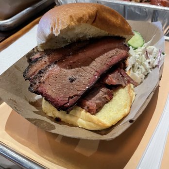 More Than Q - Brisket sandwich with pickled cucumbers and creamy coleslaw - Barbeque Near Me - Princeton, New Jersey More Than Q - Brisket sandwich with pickled cucumbers and creamy coleslaw - Barbeque Near Me - Princeton, New Jersey
