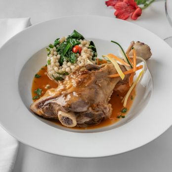 Meson Sabika - Lamb shank with Mediterranean couscous - Tapas Bars Near Me - Naperville, Illinois Meson Sabika - Lamb shank with Mediterranean couscous - Tapas Bars Near Me - Naperville, Illinois