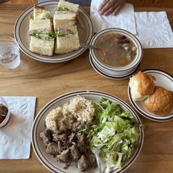 Lilikoi glazed ham sandwich. Spicy pork plate with locally grown chopped salad and homemade Portuguese bean soup with sweet bread.