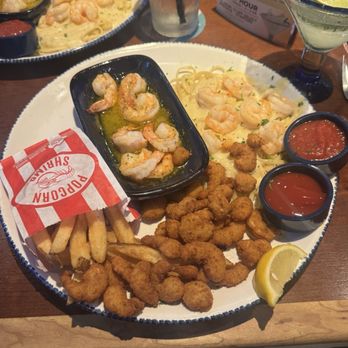 Red Lobster - Platter- popcorn shrimp, shrimp scampi, and shrimp alfredo - Seafood Near Me - Orlando, Florida Red Lobster - Platter- popcorn shrimp, shrimp scampi, and shrimp alfredo - Seafood Near Me - Orlando, Florida