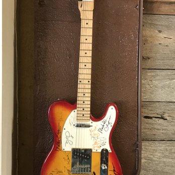 Puckett's Restaurant - Signed guitars hang on the walls - Barbeque Near Me - Franklin, Tennessee