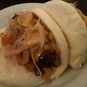 RM 212 - Kurobuta Sausage Baos: apple & onion slaw, pineapple chutney & wasabi aioli ($9.95) - Cocktail Bars Near Me - San Francisco, California RM 212 - Kurobuta Sausage Baos: apple & onion slaw, pineapple chutney & wasabi aioli ($9.95) - Cocktail Bars Near Me - San Francisco, California