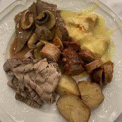 Hanover Manor - Potatoes, chicken franchise, roast beef, sausage, and mushroom meat and gravy.