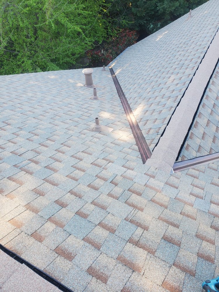 Slide of Ken Cooper Roofing and Gutter Systems, Inc