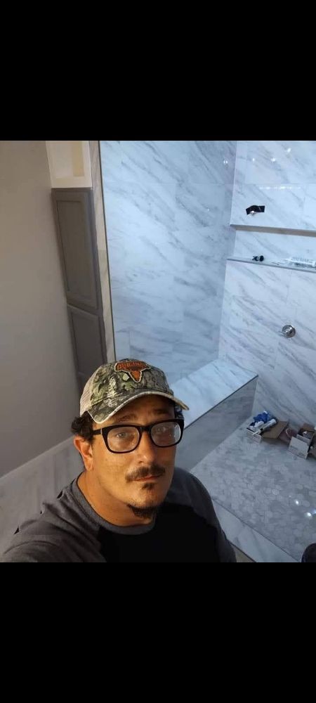 Slide of Bathmatic Custom Tile and Shower