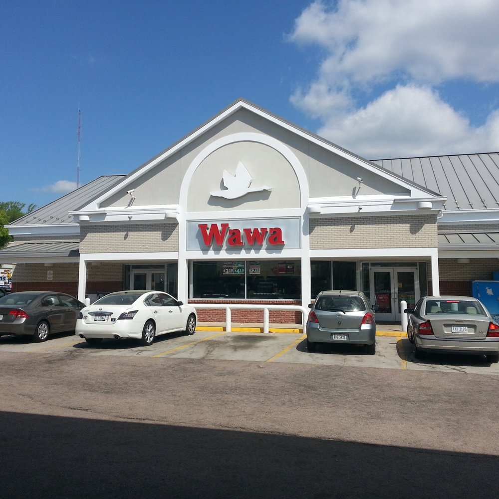cars parked in front of a restaurant