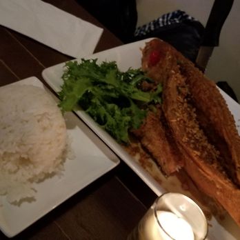Lantern - Fried red snapper with fried garlic dressing with rice. - Thai Near Me - Brooklyn, New York