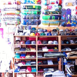 Non Factory Skate Shop - A section of the deck wall. And a section of the hat shelf.