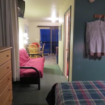 The Sea Lion Cove - Homer, Alaska - Our room had 1 bed & a futon used as a bed. The kitchen floor could easily accommodate 3-4 more people. - Vacation Rentals Near Me - Homer, Alaska