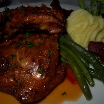 Le Petit Bistro - Demi Canard Roti A L'orange (roasted half duck in orange fruit sauce).  Side of mashed potato, green beans and poached pear. - French Near Me - Mountain View, California