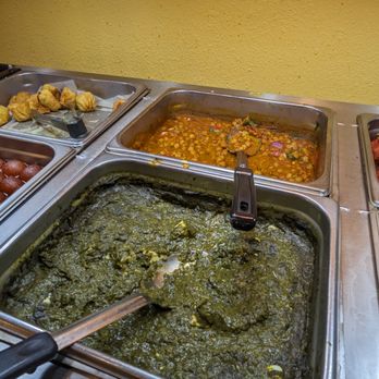 Swad - a variety of food items in a buffet - Indian Near Me - Monona, Wisconsin