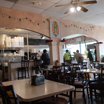 Tacos El Norte - Bar seating and open kitchen in the background. - Mexican Near Me - Highwood, Illinois Tacos El Norte - Bar seating and open kitchen in the background. - Mexican Near Me - Highwood, Illinois