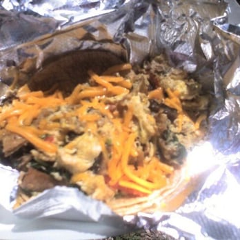 Mellizoz Tacos - Migas Breakfast Taco + spinach & mushroom (= "The Victoria") & + Bacon (= "The Pope") - Tex-Mex Near Me - Austin, Texas