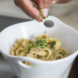 Rife Style - Photo by Cozymeal. Plant-based Cacio de Pepe with handmade dairy-free fettuccine pasta.