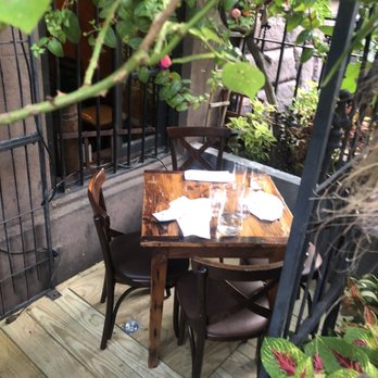 Alta - our small and secluded table in the garden - Tapas Bars Near Me - New York, New York Alta - our small and secluded table in the garden - Tapas Bars Near Me - New York, New York