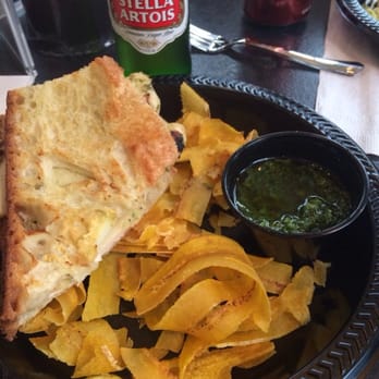 Hobby Center - 1/2 a chicken panini with goat cheese. Fried plantains with a pesto dipping sauce. Yummy! - Performing Arts Near Me - Houston, Texas