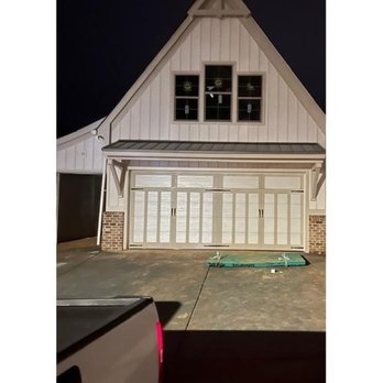 Hawk Garage Doors - Classic raised-panel garage door on a traditional home exterior -- Hawk Garage Doors - Garage Door Services Near Me Hawk Garage Doors - Classic raised-panel garage door on a traditional home exterior -- Hawk Garage Doors - Garage Door Services Near Me