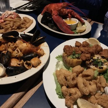 Boston Sail Loft - Steamed whole lobster, lobster Lobster Salad Roll, three Appetizer Combo Platter - Bars Near Me - Boston, Massachusetts Boston Sail Loft - Steamed whole lobster, lobster Lobster Salad Roll, three Appetizer Combo Platter - Bars Near Me - Boston, Massachusetts