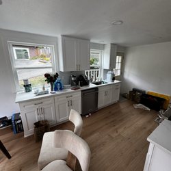 Coastline Renovations  - New open concept, kitchen, bigger windows and more cabinets