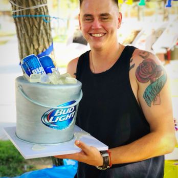 Sunshine's Cakes - Another happy customer. Beer bucket cake with ice cubes made of sugar. Flavors are strawberry cake and white chocolate raspberry cake. - Custom Cakes Near Me Sunshine's Cakes - Another happy customer. Beer bucket cake with ice cubes made of sugar. Flavors are strawberry cake and white chocolate raspberry cake. - Custom Cakes Near Me
