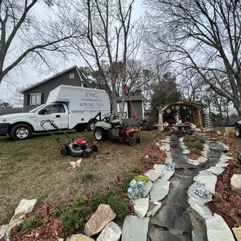 EMG Landscape - a truck parked in front of a house - Lawn Services Near Me EMG Landscape - a truck parked in front of a house - Lawn Services Near Me