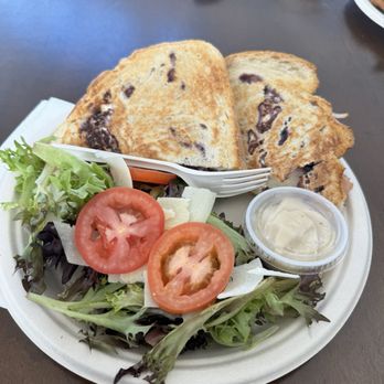 Bird Dog Bistro - Turkey and goat sandwich with a side salad - Salad Near Me - Hollywood, Maryland