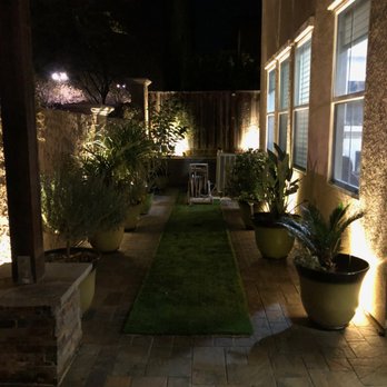 Nine Orange Landscaping - Paving stone, turf and built in lighting. - Landscaping Near Me Nine Orange Landscaping - Paving stone, turf and built in lighting. - Landscaping Near Me