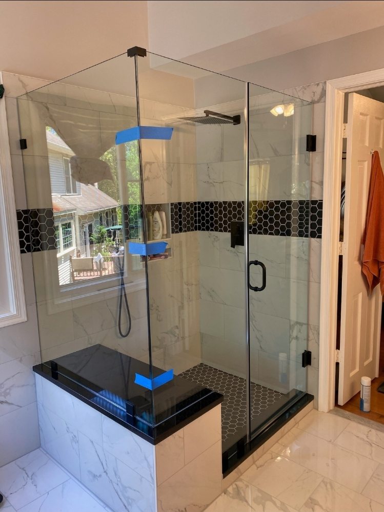 DELUXE FRAMELESS SHOWERS DOORS AND MIRRORS Updated September 2024