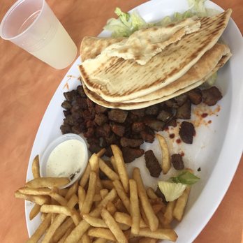 Custom made flaming gyro with lamb.   Great food. Guys are cool and good service. Will come back again  thank you