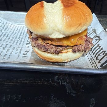 Fourths IV - Burger with an onion ring, bbq sauce, & cheddar cheese. - Burgers Near Me - Austin, Texas Fourths IV - Burger with an onion ring, bbq sauce, & cheddar cheese. - Burgers Near Me - Austin, Texas