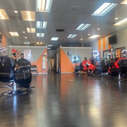 T's Barbershop - Work getting done, clean environment and a good time.