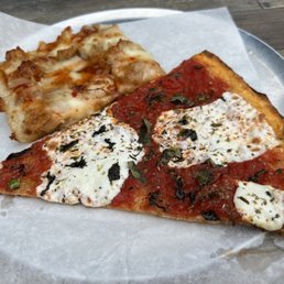 two slices of pizza on a plate two slices of pizza on a plate