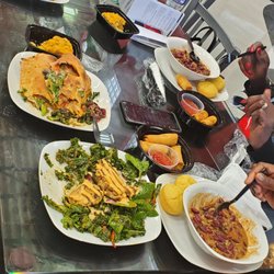 Iconic Eatery and Ice Cream Bar - We decided to get a variety beyond veggie calzones,mac and cheese beyond crab kale salad, rice and beans veggie rolls absolutely a favorite