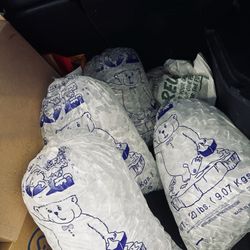 4 bags of ice next to the boxes and an empty grocery bag in my trunk.